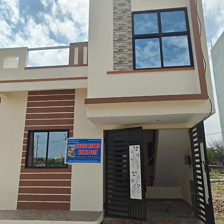 Nandi Homes Homestay Uddzsaín Kültér fotó